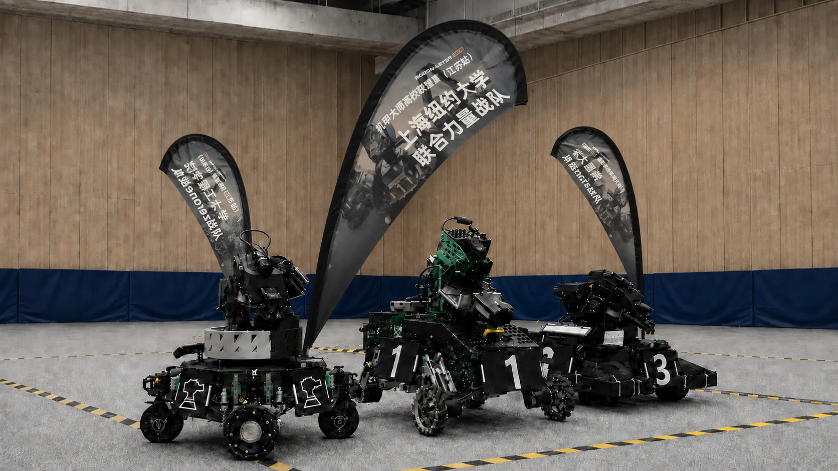 Three NYUSH RoboMaster robots arranged beneath the team flags